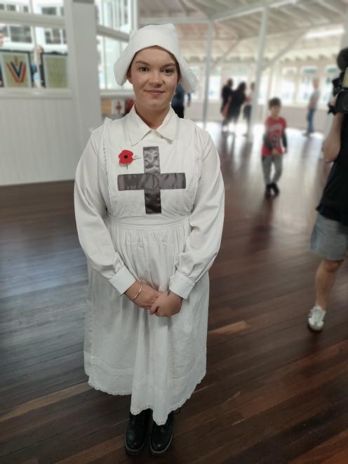 Amuri Players member Leah Grenfell greets visitors to the restored Soldiers’ Block. Photo: David...