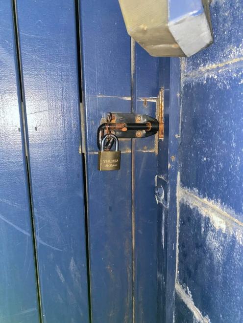 A fire exit at Dunedin’s The Bog Irish Bar is locked with a padlock. PHOTO: SUPPLIED