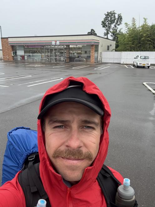 George Boanas outside one of Japan’s ubiquitous ‘konbini’ — convenience stores. PHOTO: SUPPLIED