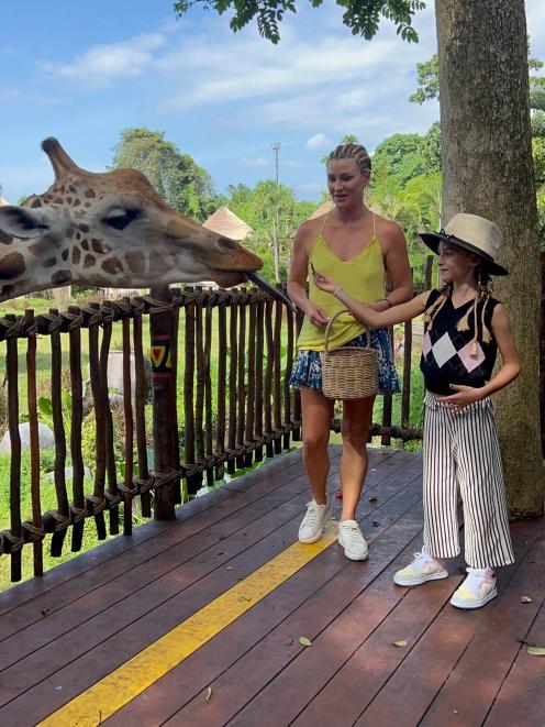 Carpenter and her daughter's two-week Bali holiday turned into more than they bargained for....