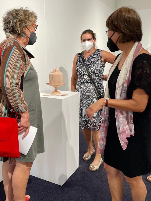 Visitors to the "Changing Threads" exhibition, in Nelson, are taken by The First Slice Won’t Hurt...