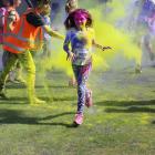 Olivia Shore (left, 9), of Wanaka, is all colours of the spectrum at the Alexandra Rainbow Run...