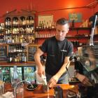 Dog With Two Tails cafe owner Chris Wilson says good coffee is the cafe’s strength. Photos by Craig Baxter.