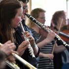 Dunedin Symphony Orchestra musicians (from left) Lydia Anderson (trumpet), Natasha Manowitz ...