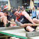 Slade Thomas, of Oamaru, puts his weight into the Snap Fitness team’s pull in the tug-of-war...