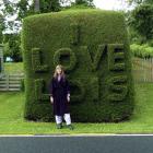 Lois Skellett with the Warrington love hedge. Photo by Chris Skellett.