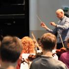  Prof Peter Adams conducts the first full orchestra rehearsal. PHOTOS: HAMISH MACLEAN

