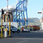 Emergency services assess the scene of a gas cylinder explosion which killed a crew member on...