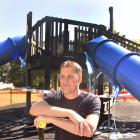 Mosgiel Community Playgrounds Trust chairman Geoff Woodcock at the fire-damaged playground at Mosgiel Memorial Park yesterday. Photo by Peter McIntosh.