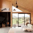 Windows are carefully positioned to screen out neighbours and frame the views. The home’s owner...