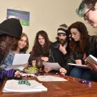 Dungeons & Dragons players (from left) Morgan Stanley (19), Jasmine Mawson (21), Daniel Stride (34), Steven Hindle (26), Jess Keogh (24) and Rowan Stanley (24) satisfy their thirst for fantasy. Photos by Peter Mcintosh.