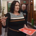 Patrice Harrex, accompanied by union organiser Jon Henning, delivers the Public Service...