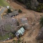 A massive slip surrounded Gordon Sasse's Blanket Bay home on Saturday morning. Photo: Gerard O'Brien