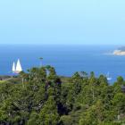 Tawharanui Regional Park offers spectacular views to the islands of the Hauraki Gulf beyond a...