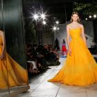 Herrera stayed true to her glamorous and feminine silhouettes, bright hues of red, iris and yellow. Photo: Reuters