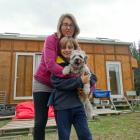 Tiny house advocate Anja O’Connor and her son Jake (8) and Ziggy the dog have lived in a tiny...