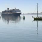 Cruise ship Noordam ghosts up Otago Harbour yesterday morning. Photos: Gerard O'Brien
