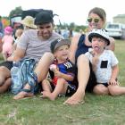 Parents Reon and Jody Wharerimu, of Fairfield, watch their children  Grayson (2, left) and Roman ...