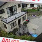 The female driver of this Nissan Sunny was taken to Lakes District Hospital early yesterday afternoon after the vehicle crashed through a fence and fell almost 7m, landing on its roof centimetres away from a residential property at Redfern Tce, in Arthur'