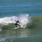 Dunedin surfers Elliott Brown (under-18 boys), Josh Thickpenny (over-30 men) and Jack McLeod ...