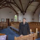 Pukehiki Church Trust member Derrick Railton inside the building,  which might cost up to $500...