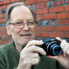 Dunedin poet Peter Olds no longer has his faithful Pentax SLR but uses this compact digital...