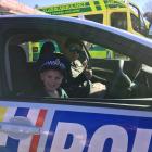 Laikyn Triggs (4), of Temuka, takes the wheel of a police car while her dad, Brad (a driver for...