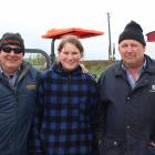 Staying warm are (from left) Graham Denize, of Oamaru, Ashley and Richard Robinson, of Dunback. Photos: Ella Stokes