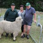 Anita Erskine (left) went all the way from Tuatapere to buy this ram bred by Rolleston farmers Karen and Leo Ponsonby for $610. Photos: Sally Brooker