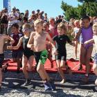 A group of year 4 pupils take off at the start of the challenge; there was not much between this group of year 4 athletes when they exited the water. Photos: Sean Nugent