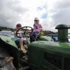 Cousins Zac Townsend (5) and Carrie Ambler (6) try out one of the tractors displayed by the North Otago Vintage Machinery Club. Photos: Sally Brooker
