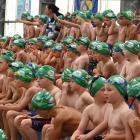 Seven-year-old boys wait for their turn to swim in the Weet-Bix Kids' Tryathlon in Mosgiel...