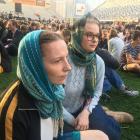 Emily Wood (left) and Thea Bailie-Bellew are among many wearing hijabs in solidarity with the...