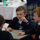Waihi School pupils Luc Morland (9, obscured), Fynn Borrie (11, centre) and Mark Crosby (9) took...