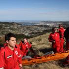 Dunedin Red Cross search teams look for survivors of a notional plane crash in the hills above...