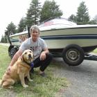 Dunedin’s Callum Fissenden, with Harry the dog, has been camping at the Waitaki lakes for about...