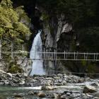 The newly built bridge at Giants Gate on the Milford Track replaced the old one which was damaged...