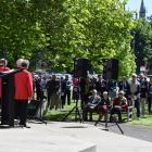 Otago Girls' High School pupil Mary Cavanagh reads to the crowd. PHOTOS: SHAWN MCAVINUE