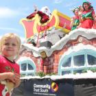 Pyper Brown was thrilled to see Santa Claus during the Southland Christmas Parade. PHOTOS: LUISA...