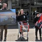 Pleased with their Boxing Day purchases are John McCormick and his children Lily (13) and Jakob ...