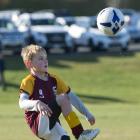 Maori Hill Red player Ollie Agnew (9) warms up before a game at the annual Green Island Junior...