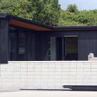Clad in dark aluminium, this T-shaped Ocean View property has a back gate leading to the beach....
