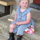 Annie O’Neill (2) tries to cool off with an ice block on a hot day in Clyde on Saturday. PHOTO:...