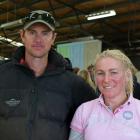 Earnscleugh Station owners Duncan and Amanda Campbell in their woolshed at their 37th annual bull...