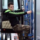 Dunedin resident Phoenix Curwood climbs up one of the Special Rigs for Special Kids yesterday....