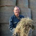 Frei Dairy farm owner Adrian Frei makes nearly all of the feed on his organic farm including hay...