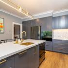 Shaker-style cabinets reflect the home’s traditional character.


