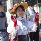 Walking in the Grand Street Parade is Fiorella Leaw, of Malaysia. PHOTOS: ARROW KOEHLER