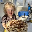 Is that for me? ... Charlie George, 2, of Auckland, admires the trifle at grandma’s on December...