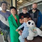 Oamaru Railway Station owners Jared Yuan (left) and Tina Wang, with their son Jayden, 4, were...